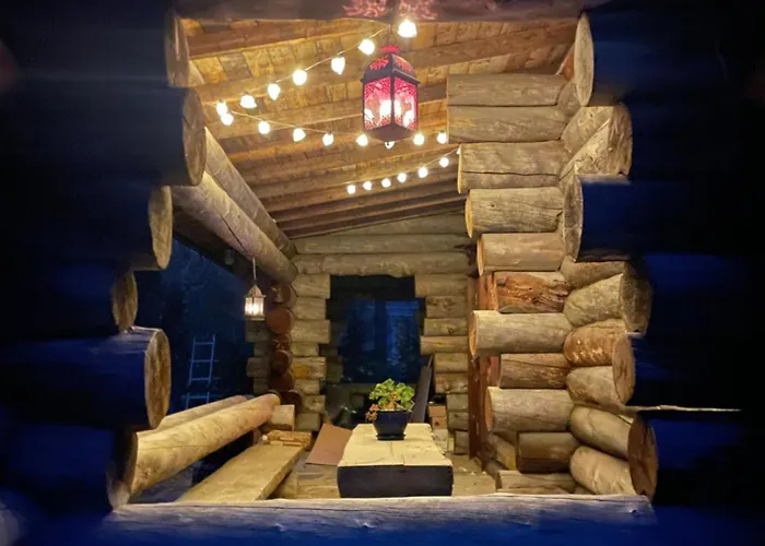 Lomamökit Suvantokoto Riverside Log